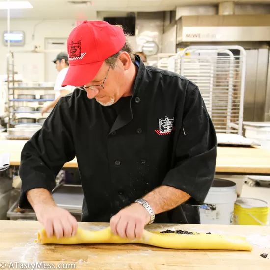 Making poppy seed strudel at 3 Brothers Bakery Houston