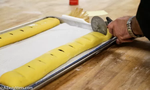 Making poppy seed strudel at 3 Brothers Bakery Houston